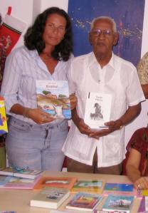 The author, Ariadne Faries, with Elis Juliana (qepd) presenting his children's books in 2006.