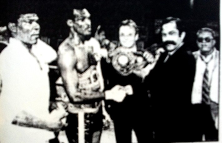 Ibi collecting one of his championship belts (early 1990s).